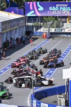 The cars leave the pits at the start of practice