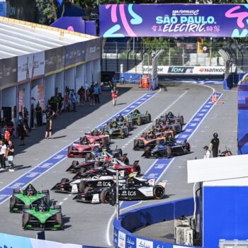 The cars leave the pits at the start of practice